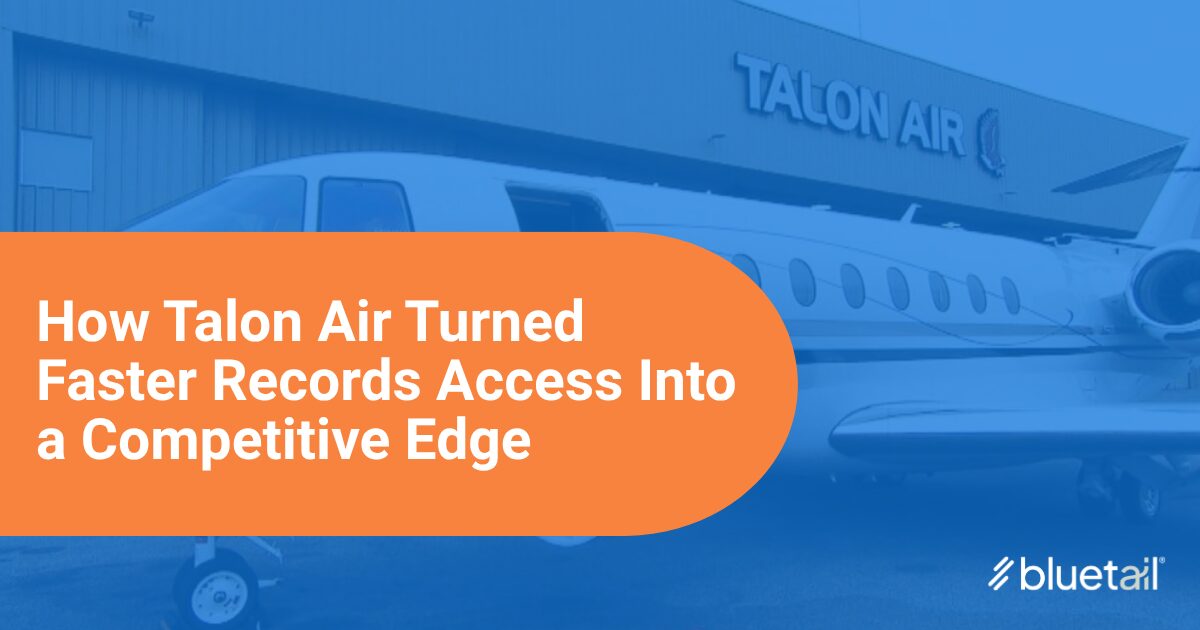 Talon Air private jet parked on the tarmac in front of the company's hangar